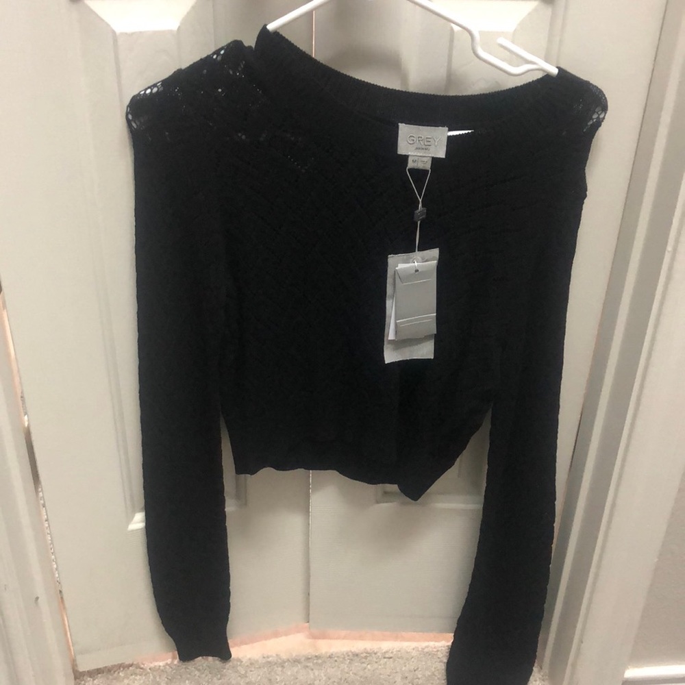 Black sweater brand is Grey by Jason Wu